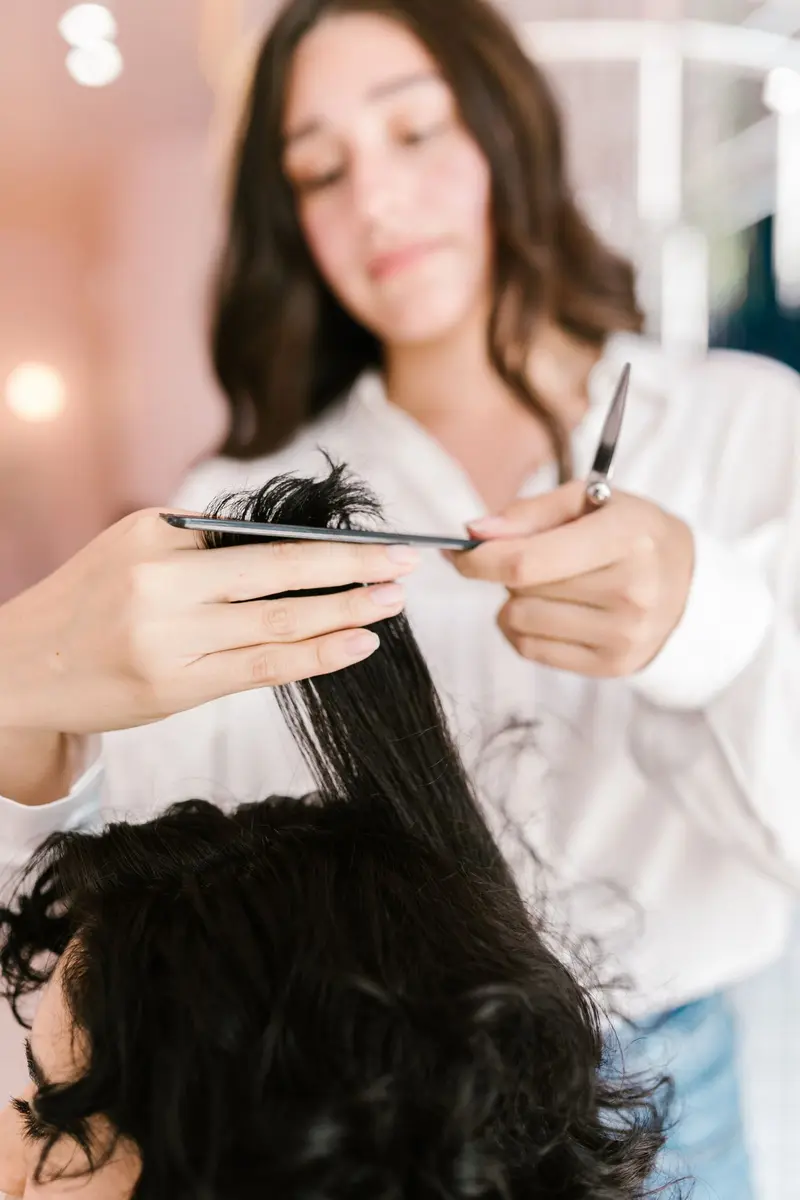 Close-up of shears cutting hair